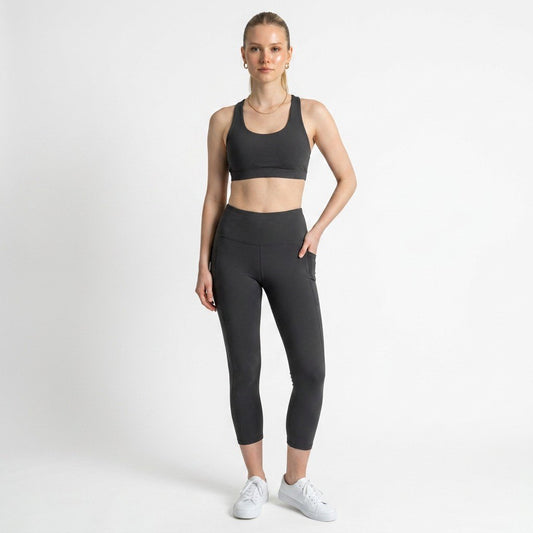 Model wearing Lynn's Closet Boutique gray Lululemon high-rise Align leggings with side pockets and matching sports bra