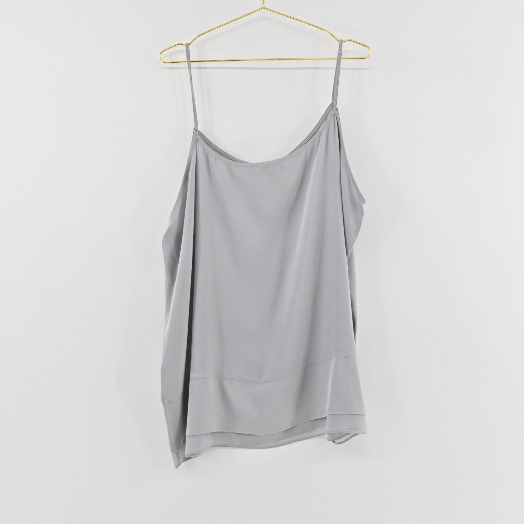 Lynn's Closet Boutique gray silk-blend camisole with adjustable spaghetti straps and a layered hem detail.