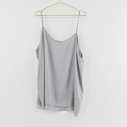 Lynn's Closet Boutique Nouvelle gray silk-blend camisole with adjustable spaghetti straps and layered hem detail.