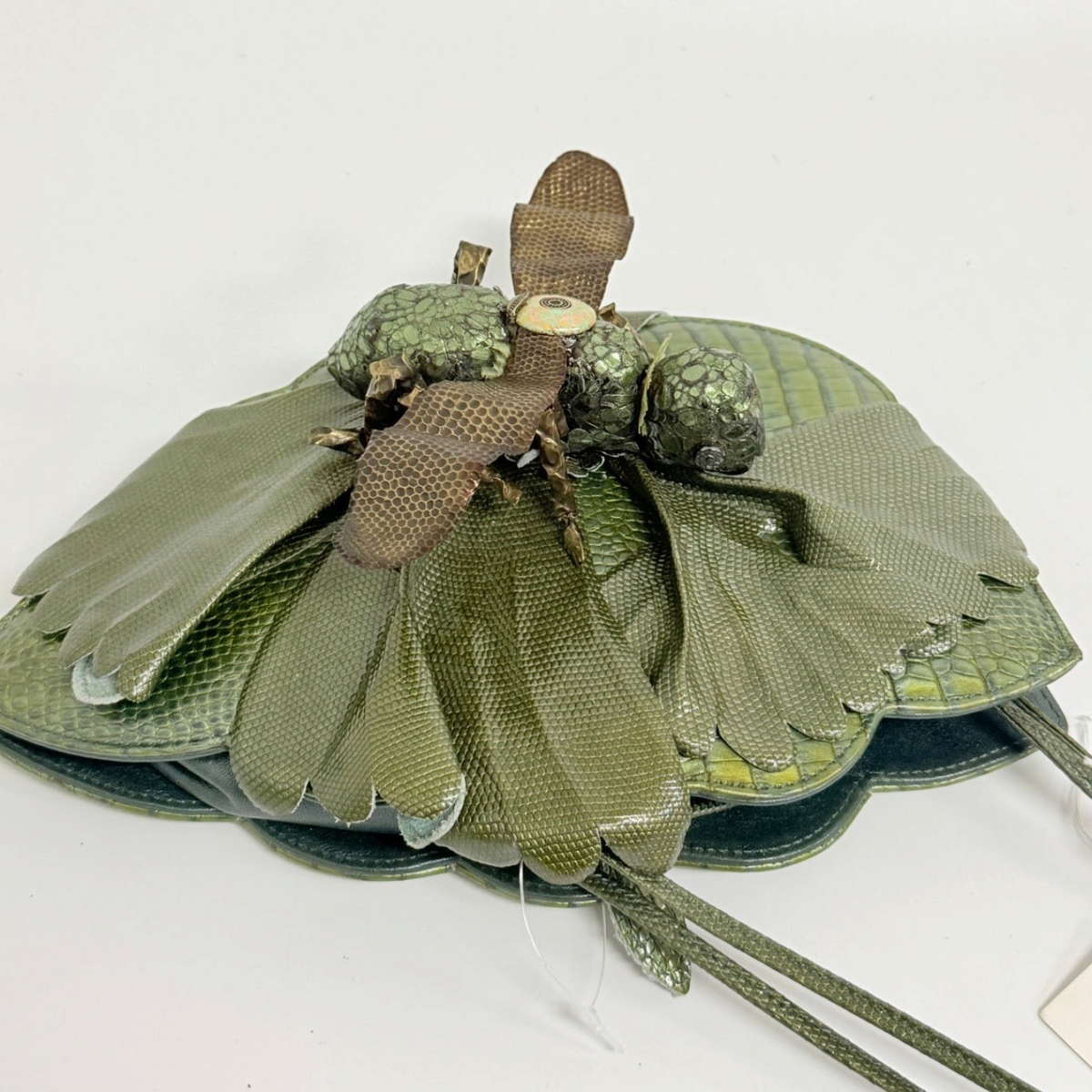 Lynn's Closet Boutique Mood Indigo grasshopper-shaped green genuine leather handbag with textured wing details.
