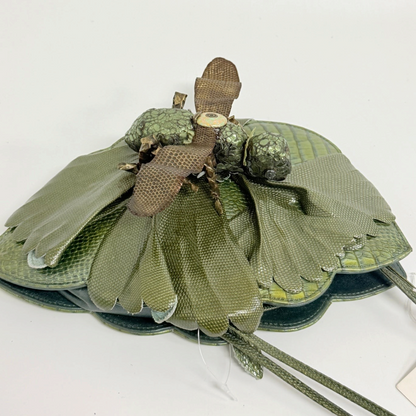 Lynn's Closet Boutique Mood Indigo grasshopper-shaped green genuine leather handbag with textured wing details.