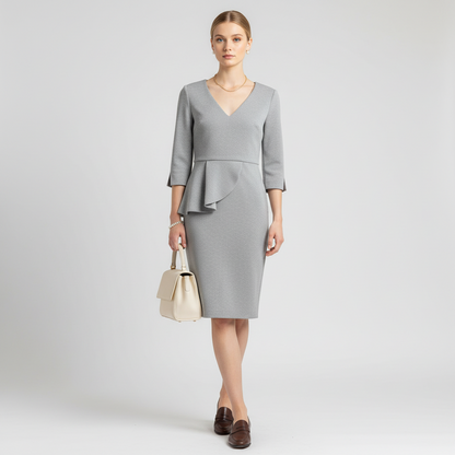 Lynn's Closet Boutique Badgley Mischka heather grey scuba sheath dress with V-neck, peplum waist, and 3/4 sleeves.