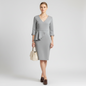 Lynn's Closet Boutique Badgley Mischka heather grey scuba sheath dress with V-neck, peplum waist, and 3/4 sleeves.