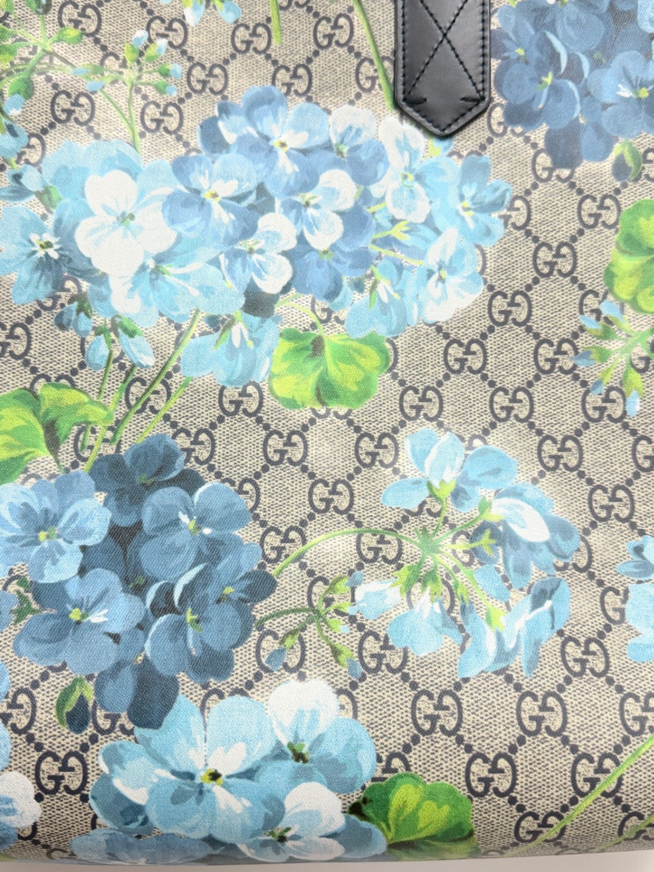 Lynn's Closet Boutique Gucci GG Supreme canvas tote with blue floral blooms print and black leather handle detail