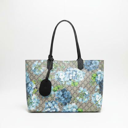 Lynn's Closet Boutique Gucci GG Supreme reversible tote featuring a blue floral print on beige monogram canvas