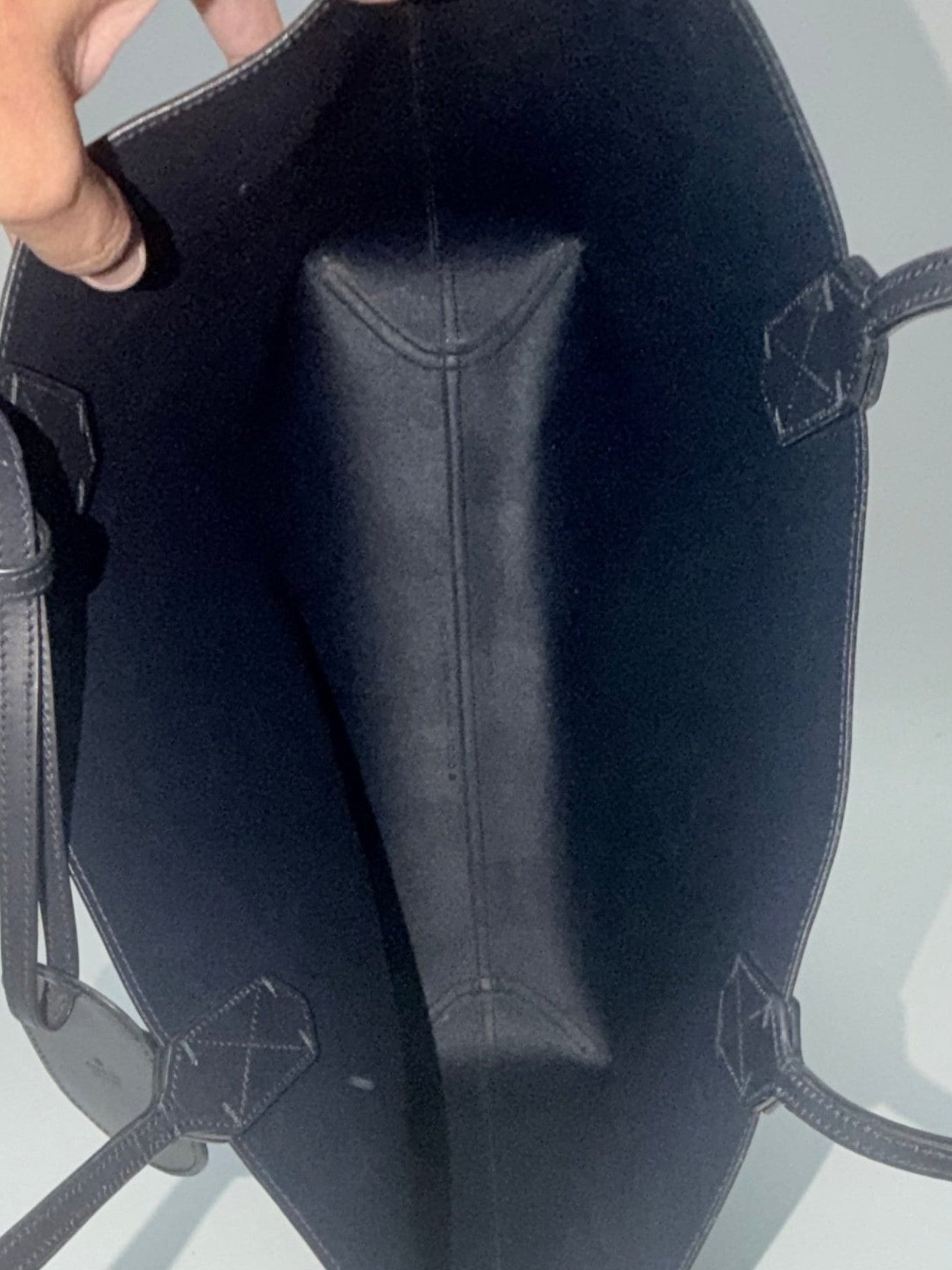 Lynn's Closet Boutique Gucci GG Supreme reversible tote interior view showing black leather lining and sturdy handles