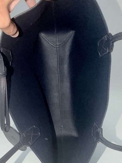 Lynn's Closet Boutique Gucci GG Supreme reversible tote interior view showing black leather lining and sturdy handles