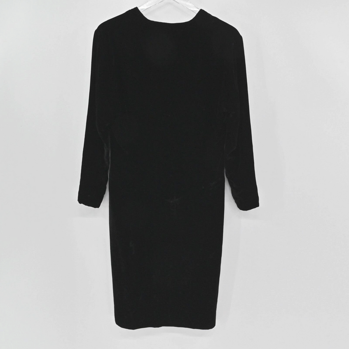 Lynn's Closet Boutique vintage 80s Guy Laroche black velvet long sleeve dress, back view on hanger.