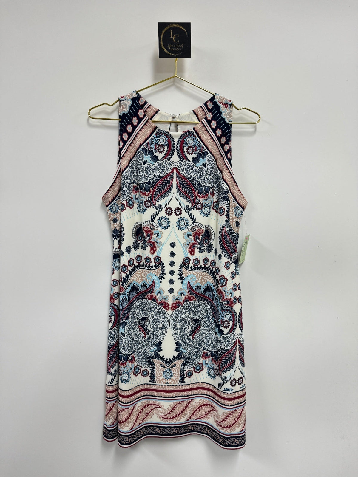 Lynn's Closet Boutique Hale Bob sleeveless mini shift dress featuring a vibrant navy, cream, and red paisley print.