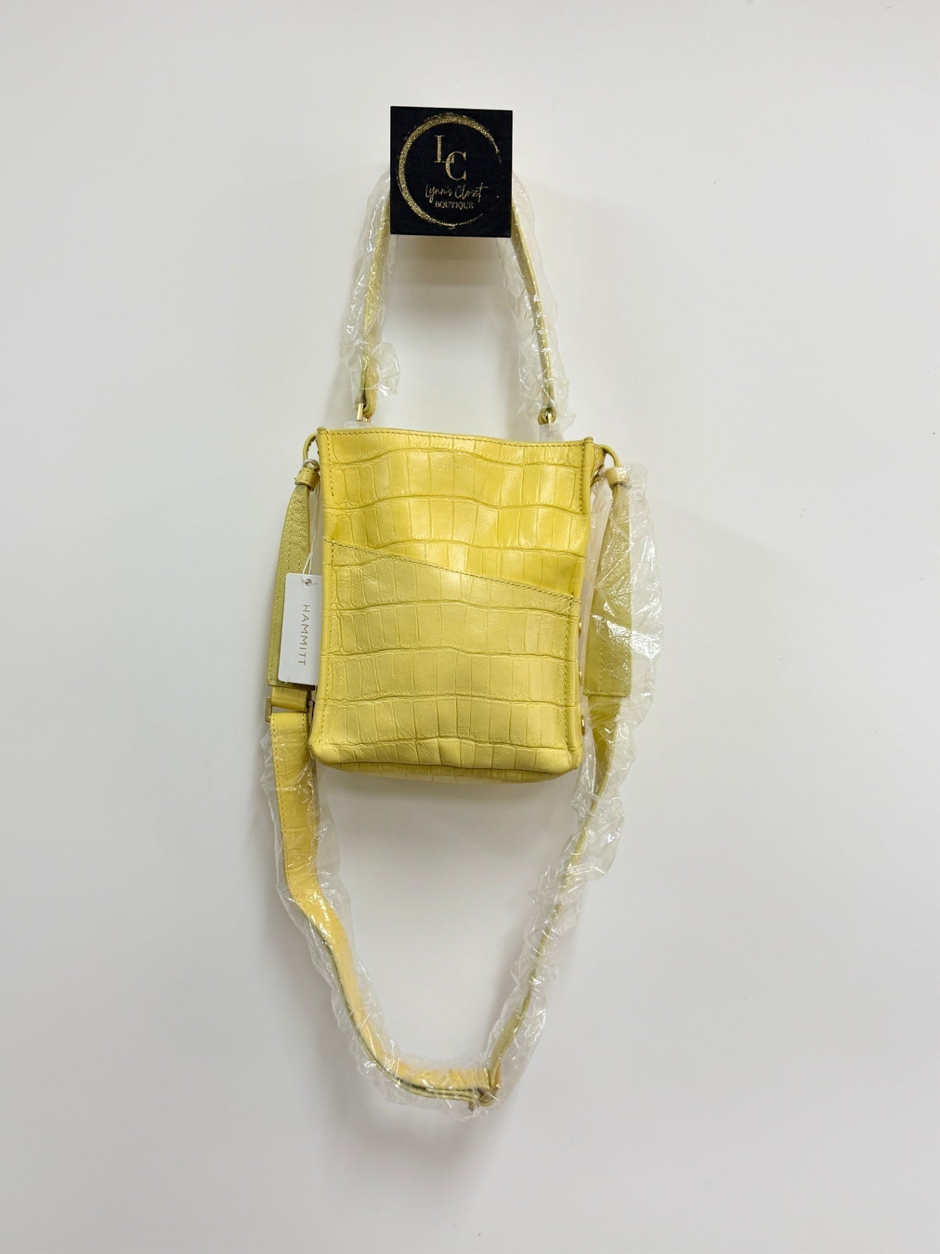 Lynn's Closet Boutique Hammitt Sunstruck yellow crocodile-embossed leather crossbody bag with an adjustable strap.
