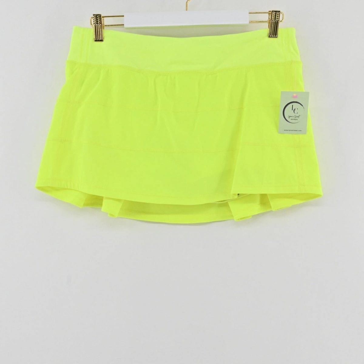 Lynn's Closet Boutique Lululemon Pace Rival mid-rise athletic skirt in bright highlighter yellow