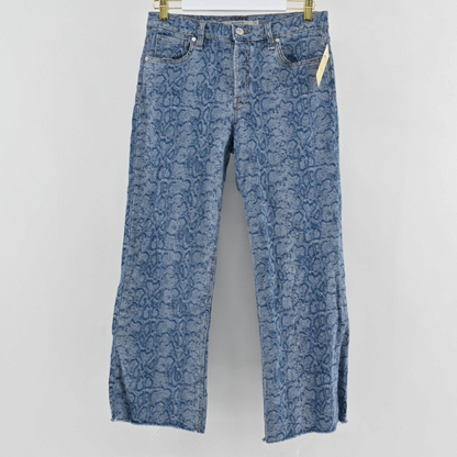 Lynn's Closet Boutique Hudson blue straight-leg jeans with an all-over snakeskin print and a raw frayed hem.