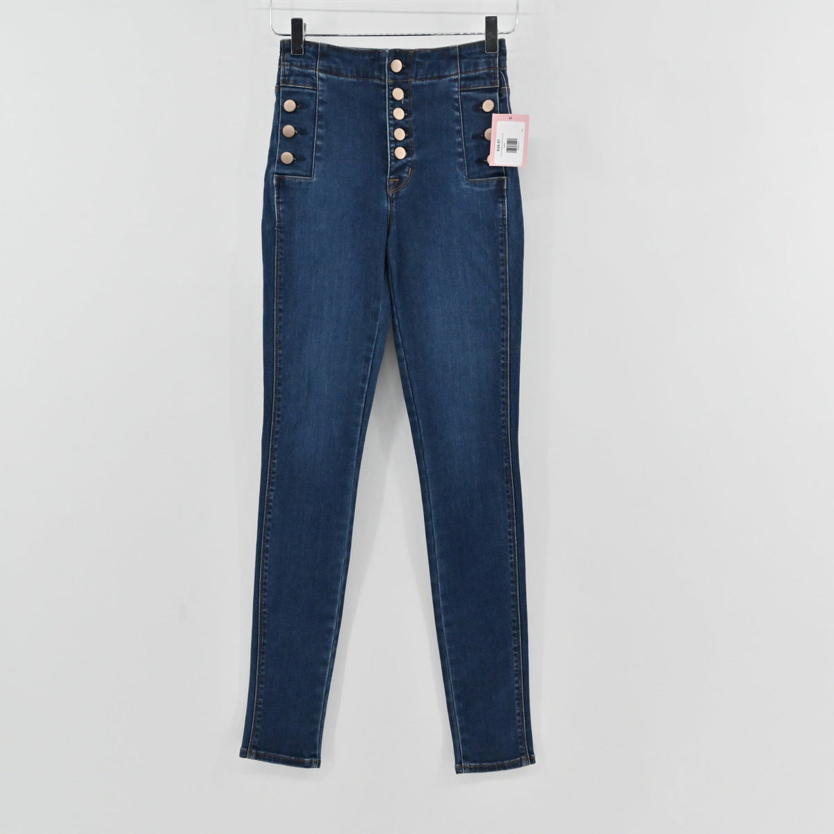Lynn's Closet Boutique J Brand Natasha high-rise skinny jeans in dark wash denim with exposed button-fly closure.