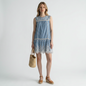 Lynn's Closet Boutique Joie dusty blue mini dress with white floral embroidery, eyelet lace hem, and ladder-stitch trim.