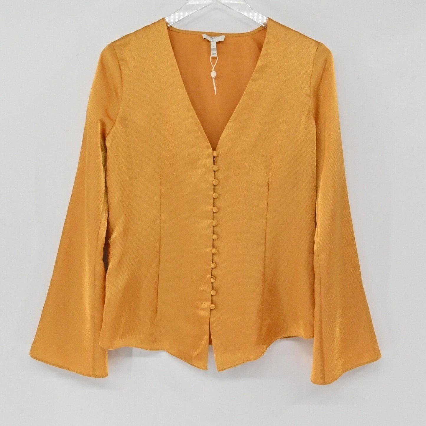 Lynn's Closet Boutique Joie Madora golden-mustard silky bell sleeve top with V-neck and fabric-covered buttons.