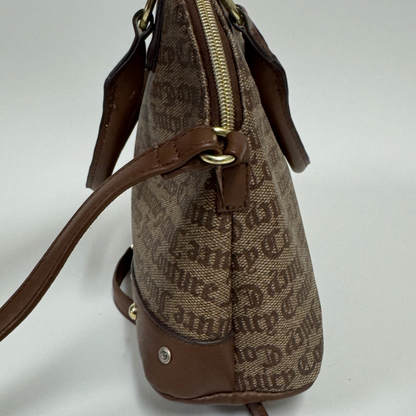 Lynn's Closet Boutique Juicy Couture chestnut and chino dome satchel with gold hardware and side view profile