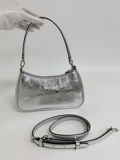 Lynn's Closet Boutique Kate Spade silver crinkle metallic shoulder bag with a removable crossbody strap.