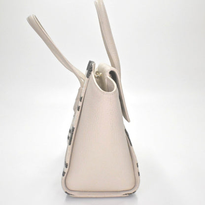 Lynn's Closet Boutique Kate Spade Daniels Drive Abigail tote bag in neutral pebbled leather with woven stripe side view