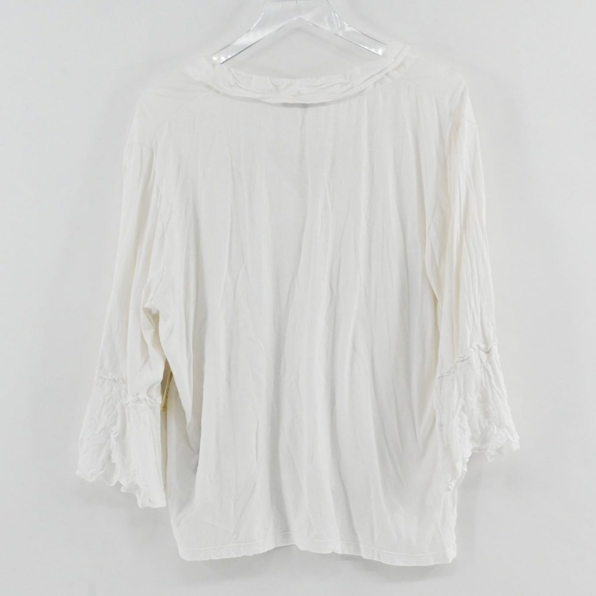 Back view of a white Kobi Halperin tie blouse with three-quarter sleeves from Lynn's Closet Boutique.