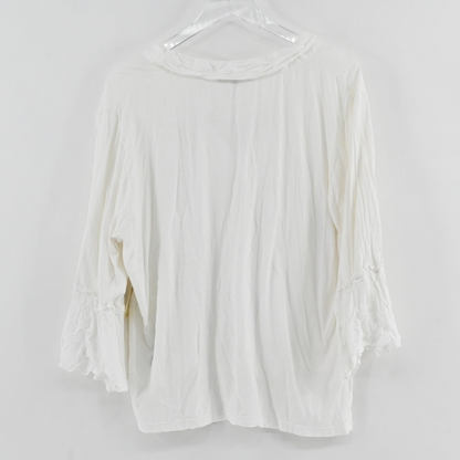 Back view of a white Kobi Halperin tie blouse with three-quarter sleeves from Lynn's Closet Boutique.