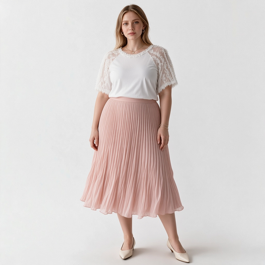 Model wearing a white Kobi Halperin Betsy ruffle sleeve top and a pleated pink midi skirt from Lynn's Closet Boutique.