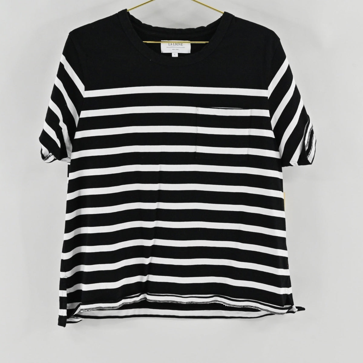 Lynn's Closet Boutique La Ligne black and white striped crew neck t-shirt with a chest pocket, size L.