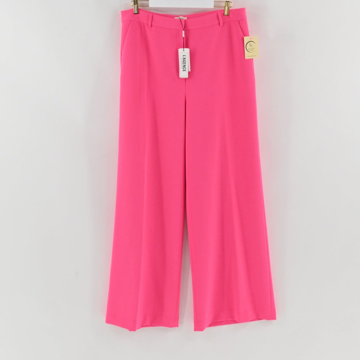 Lynn's Closet Boutique L'AGENCE hot pink wide-leg Pilar pants with high-rise waist and functional pockets.