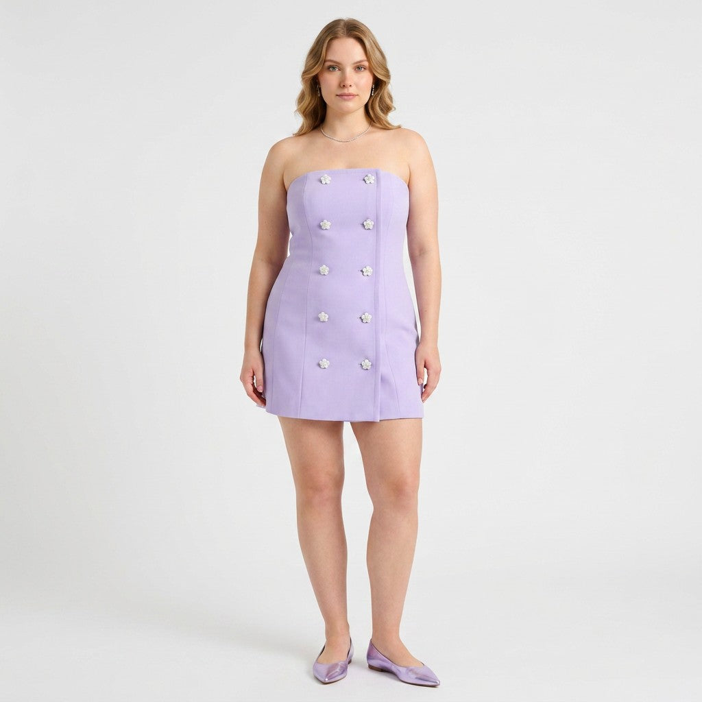 Model wearing a Lynn's Closet Boutique lilac strapless bustier dress with double-breasted floral button details