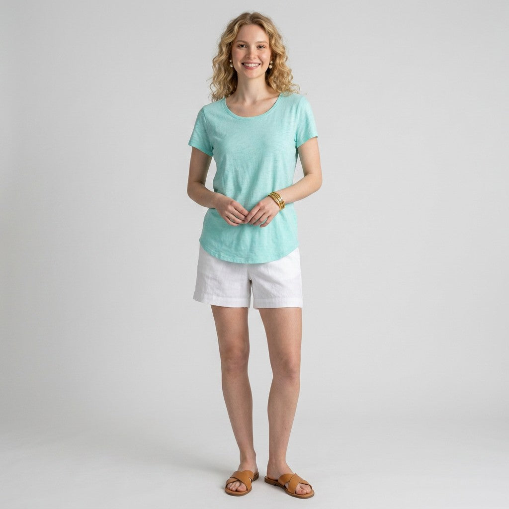 Lynn's Closet Boutique Lilly Pulitzer Etta aqua scoop neck t-shirt worn by a blonde model with white shorts