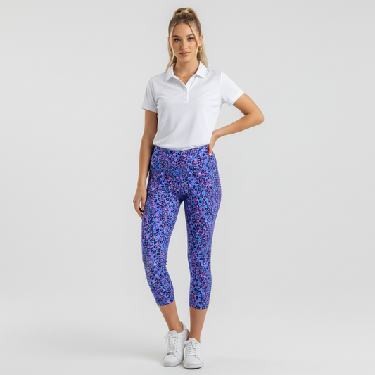 Lynn's Closet Boutique Lilly Pulitzer high rise midi leggings in blue Growl & Prowl animal print on a model