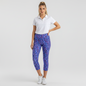 Lynn's Closet Boutique Lilly Pulitzer high rise midi leggings in blue Growl & Prowl animal print on a model