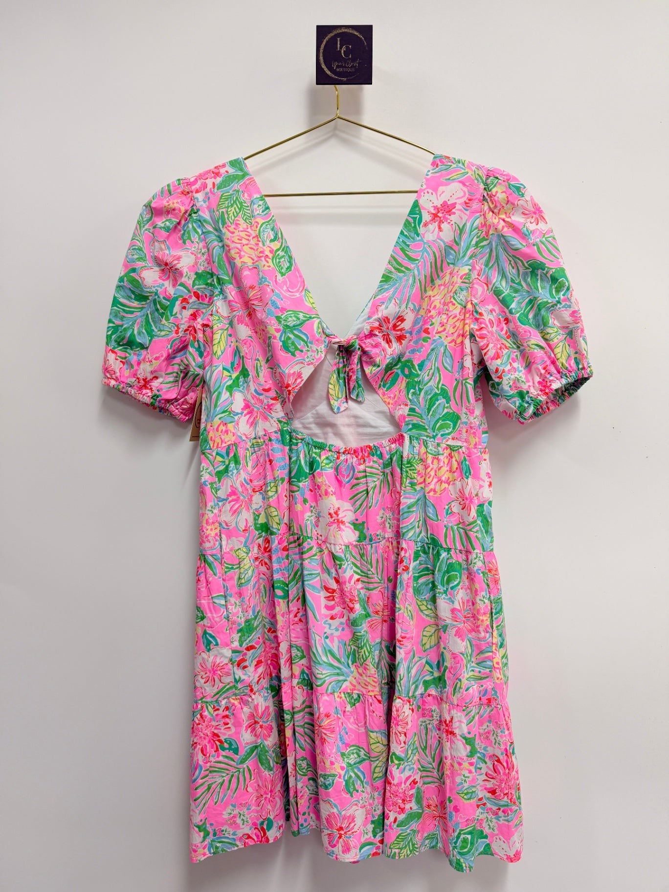 Lynn's Closet Boutique Lilly Pulitzer Nalani dress with pink and green tropical floral print, puff sleeves, and tie back