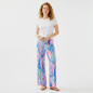 Model wearing Lynn's Closet Boutique Lilly Pulitzer Georgia May palazzo pants in blue and pink Out To Sea print