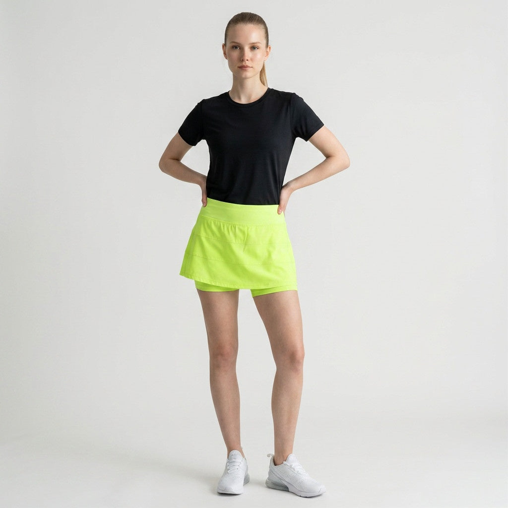 Lynn's Closet Boutique Lululemon Pace Rival mid-rise athletic skirt in highlighter yellow worn with a black t-shirt