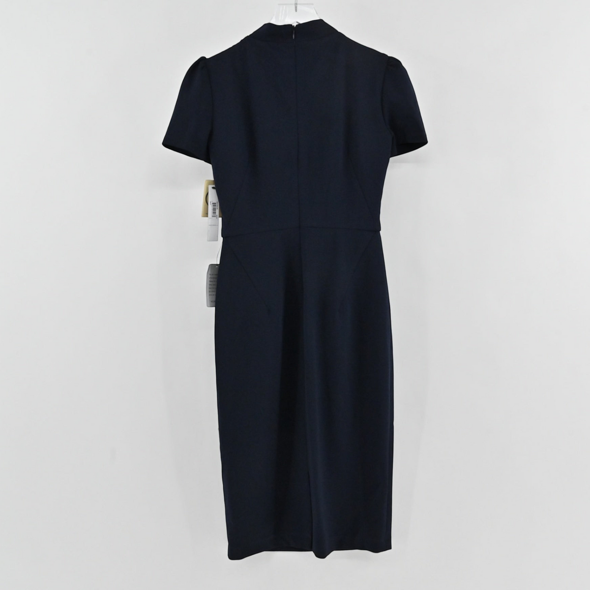 Lynn's Closet Boutique Maggy London navy midi sheath dress with short sleeves and back view on a hanger.
