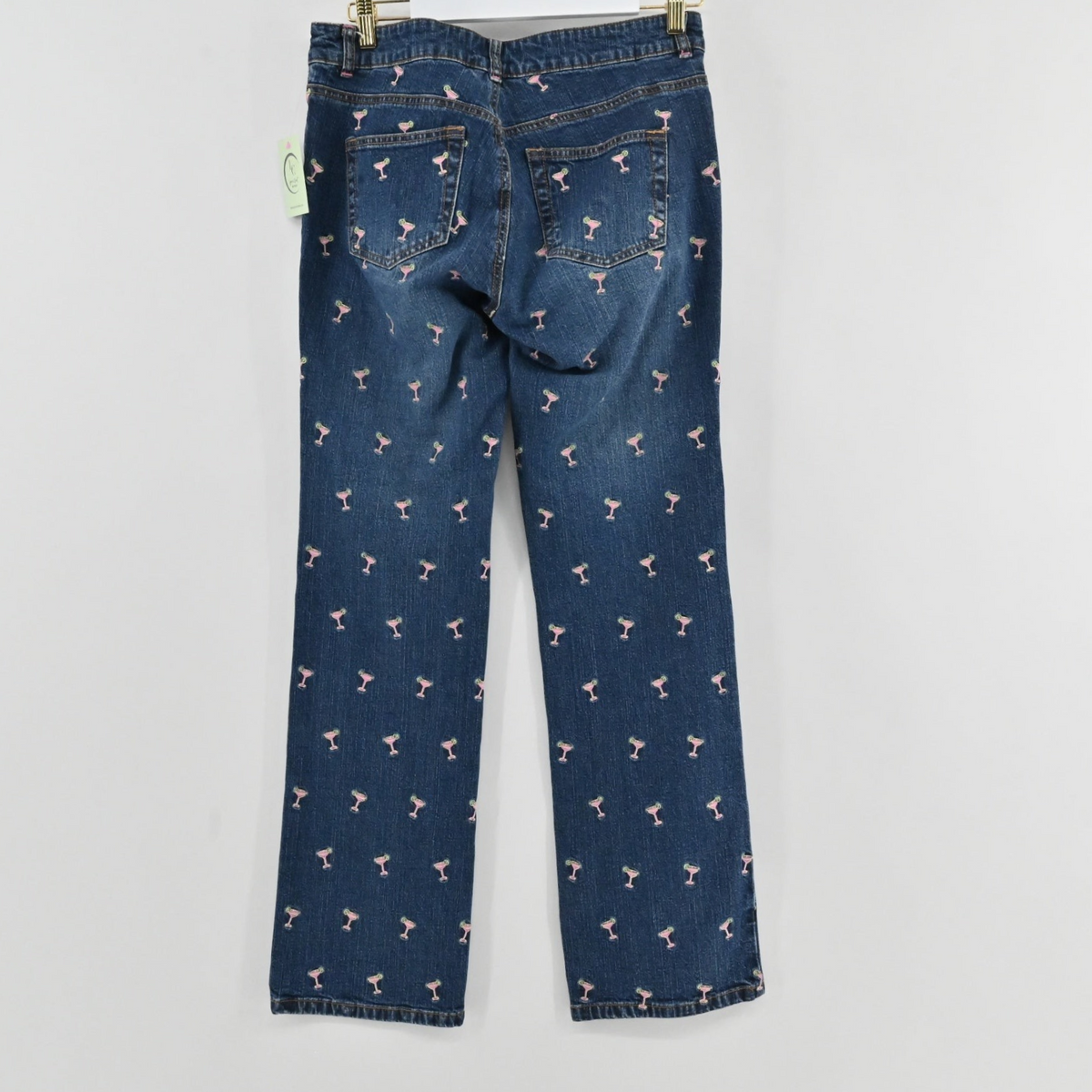 Lynn's Closet Boutique Lilly Pulitzer medium-wash denim pants with an all-over pink margarita glass print, back view