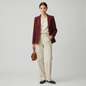 Lynn's Closet Boutique maroon Nipon blazer with crochet trim worn by a model with cream trousers and a brown bag