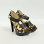 Lynn's Closet Boutique Michael Kors giraffe print calf hair platform heels with dark leather straps and gold buckles.