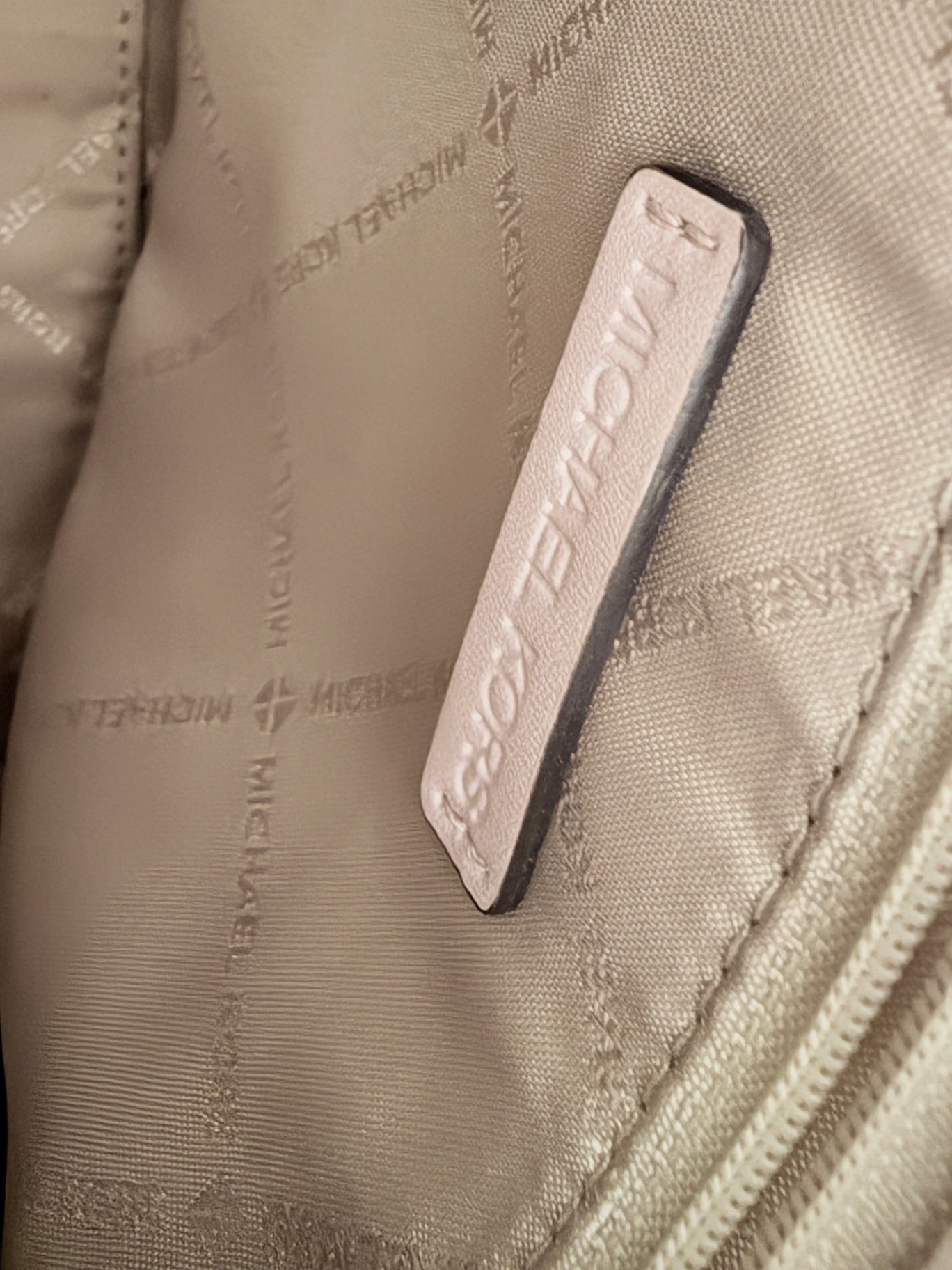 Lynn's Closet Boutique Michael Kors blush leather interior logo tag inside the Mirella small pebbled leather tote