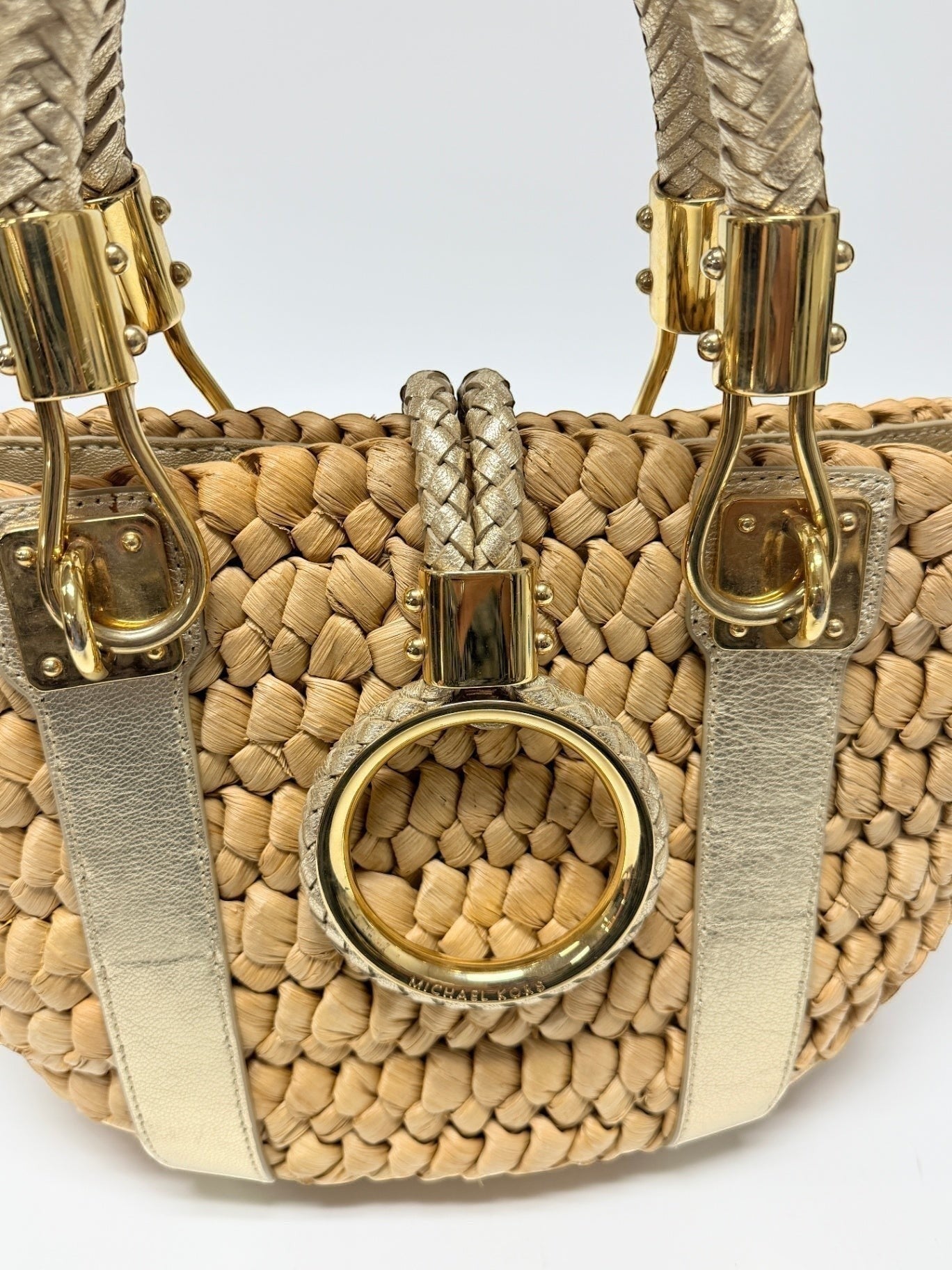 Lynn's Closet Boutique Michael Kors raffia tote with chunky woven straw, gold leather handles, and ring hardware.