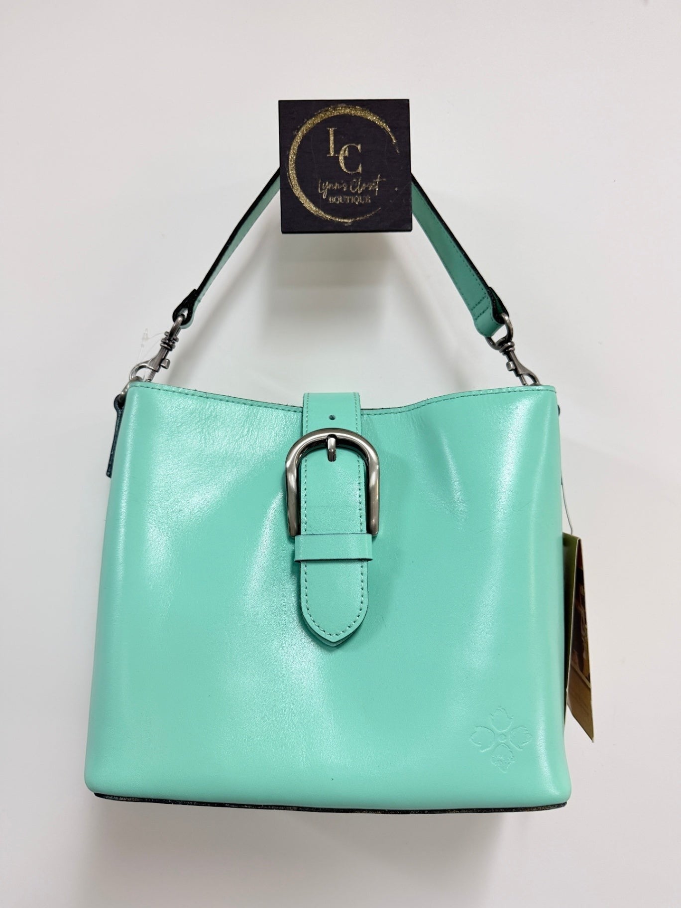 Lynn's Closet Boutique Patricia Nash Irving bucket bag in mint leather with a silver buckle closure and top handle.