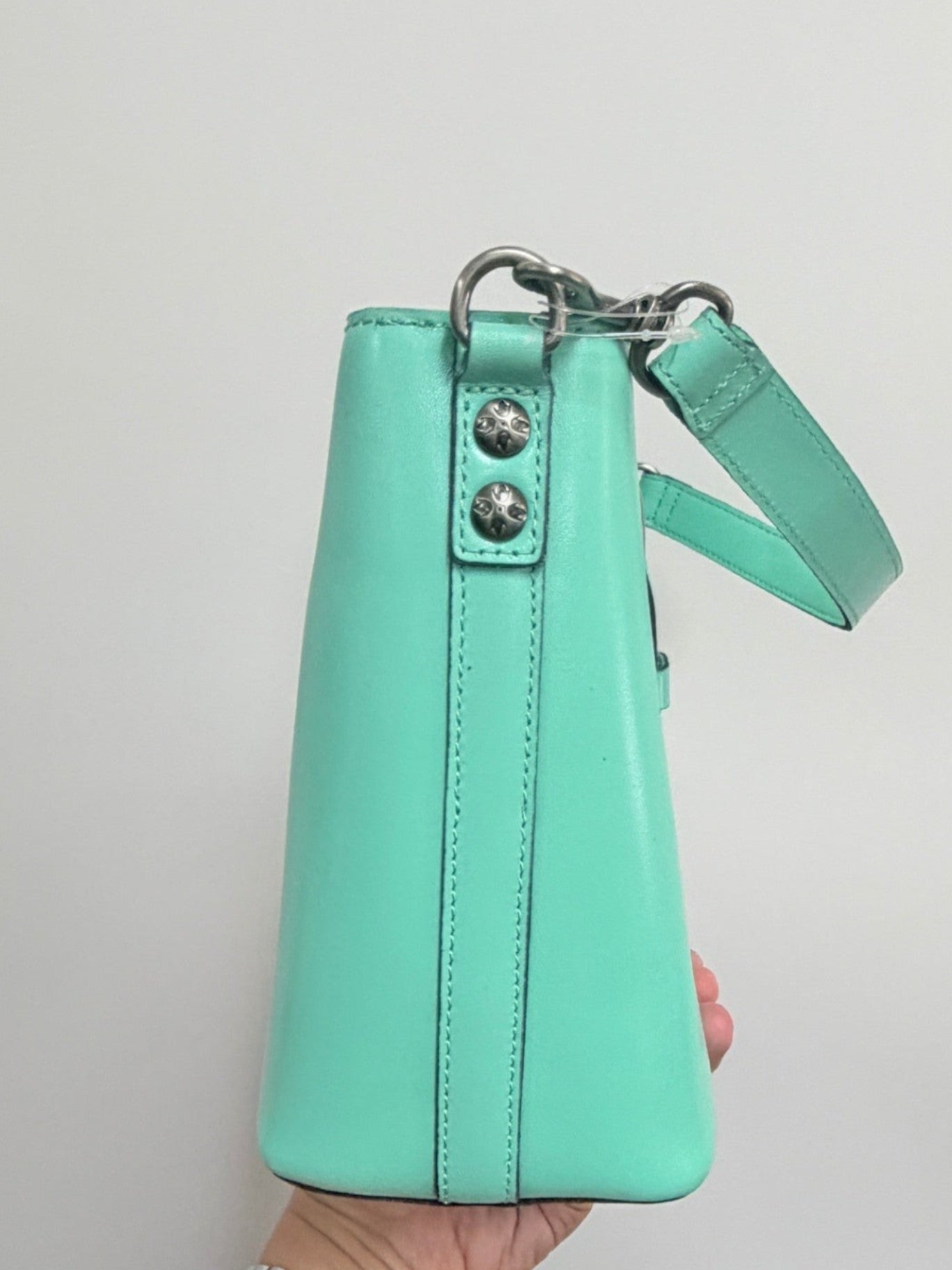 Lynn's Closet Boutique Patricia Nash Irving mint leather bucket bag side view with silver hardware details