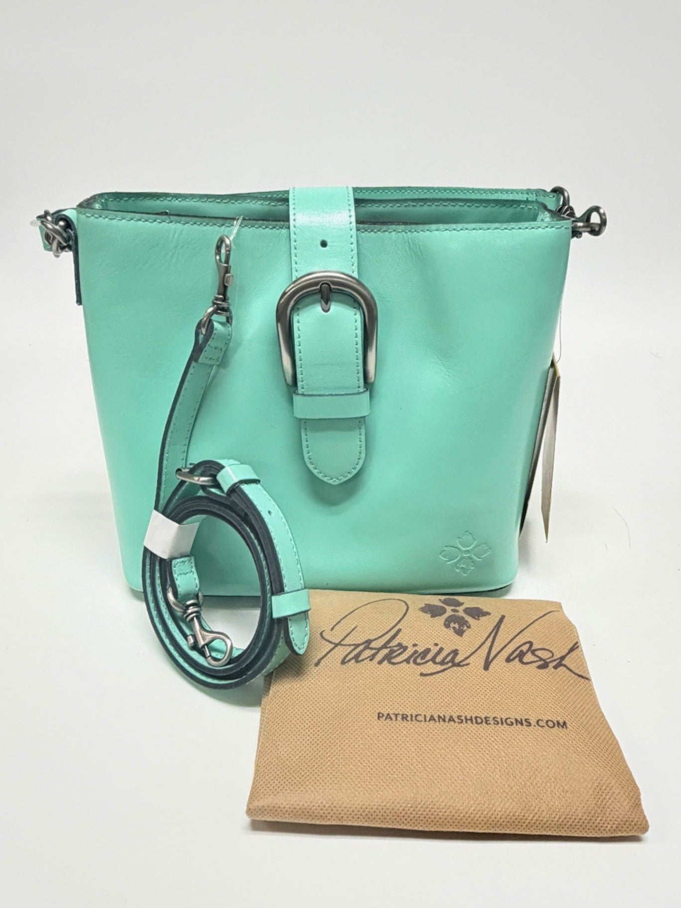 Lynn's Closet Boutique Patricia Nash mint leather Irving bucket bag with buckle closure and detachable shoulder strap.