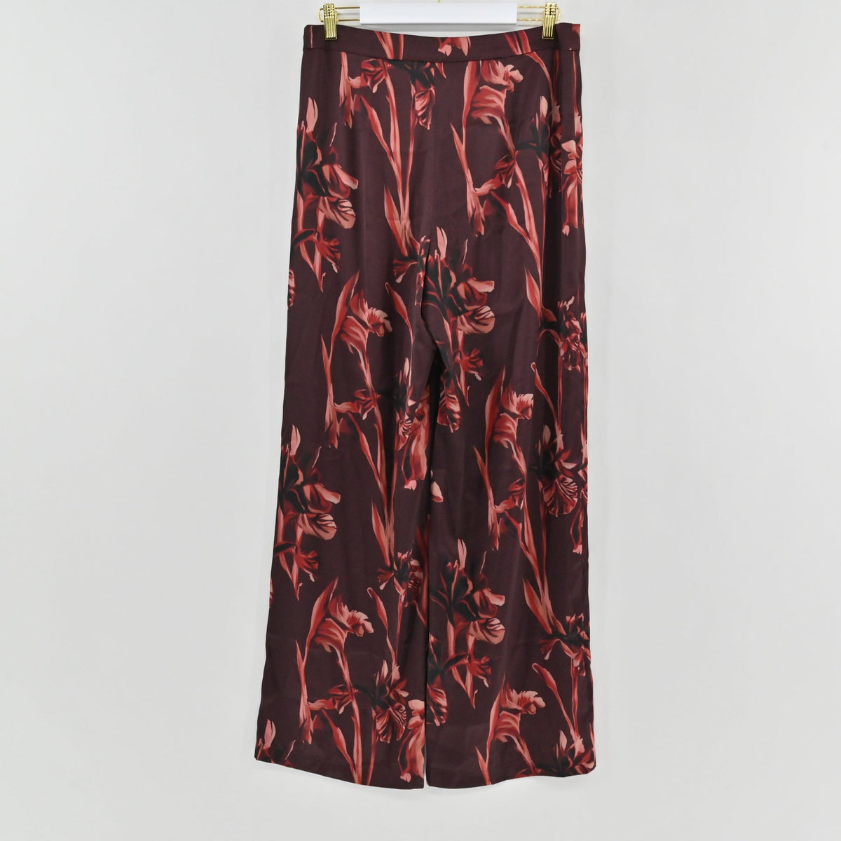Lynn's Closet Boutique Misook burgundy satin crepe straight-leg pants with a bold red and dark floral print.