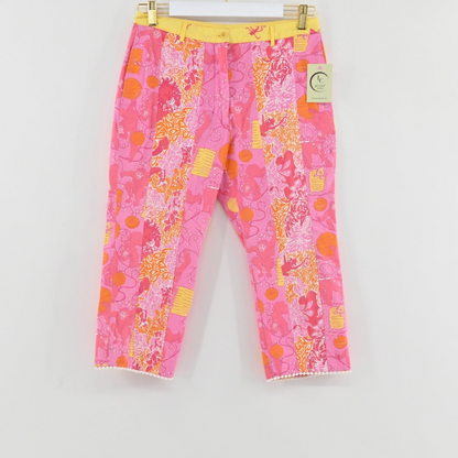 Lynn's Closet Boutique Lilly Pulitzer pink and orange monkey print cropped pants with yellow waistband and pom-pom hem