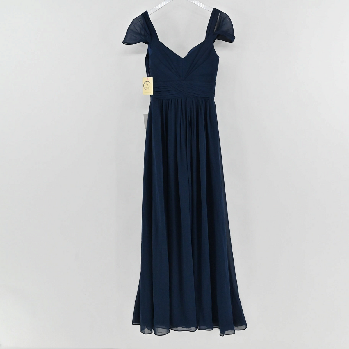 Lynn's Closet Boutique navy blue floor-length formal gown with a ruched bodice, sweetheart neckline, and flutter sleeves