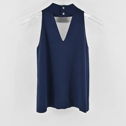 Lynn's Closet Boutique navy sleeveless knit top with a high neck, cutout chest detail, and back button closure.