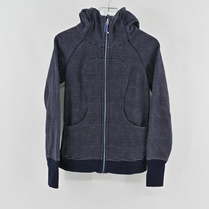 Lynn's Closet Boutique navy blue Lululemon full-zip hoodie with a white dotted pattern, high neck, and ribbed cuffs.