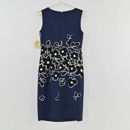 Lynn's Closet Boutique Carolina Herrera navy blue sheath dress with black and white floral print, sleeveless design
