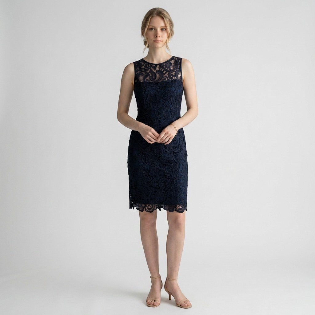Model wearing a navy blue Adrianna Papell lace sheath dress with a sleeveless design from Lynn's Closet Boutique